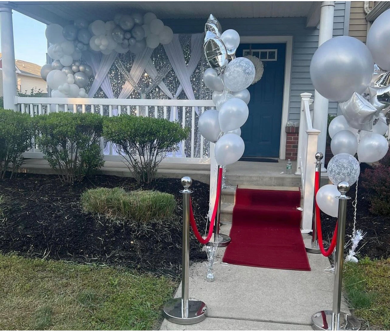 Double Backdrop, 16ft Balloon Garland, stanchions & Red Carpet