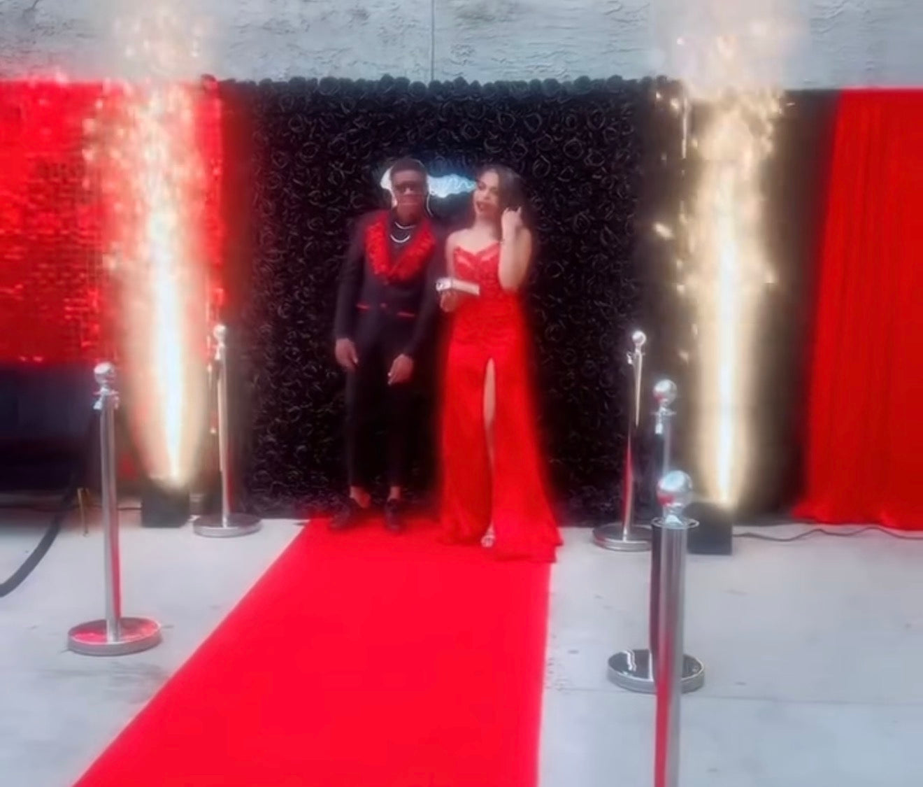 Flower Wall, Shimmer Wall,Cold Sparks, 16ft Balloon Garland, Velvet Loveseat, 20ft Red Carpet, Stanchions, Drapery Backdrop, LED Prom Sign.